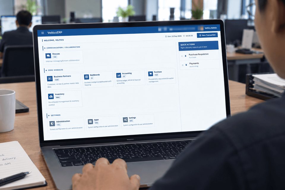 VelticsERP terbuka di laptop, menampilkan modul inti seperti Business Partners, Dashboards, Accounting, Purchase, dan Inventory.